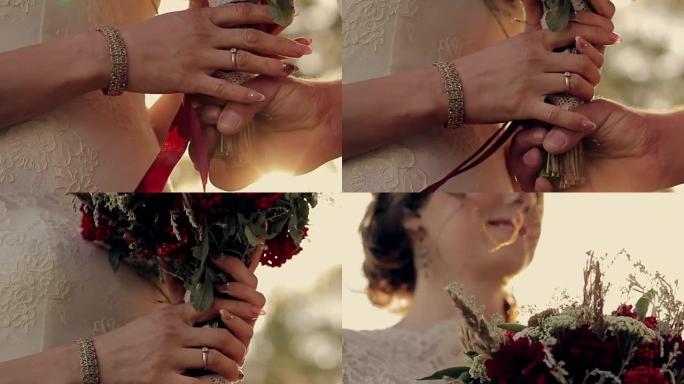 新娘和新郎在花束上的特写镜头阳光刺眼公园里的白色连衣裙美丽的年轻夫妇爱情和理解的温柔和浪漫，1080