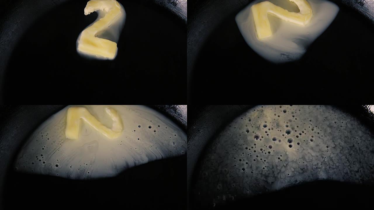 二号黄油在热锅上融化-特写顶视图