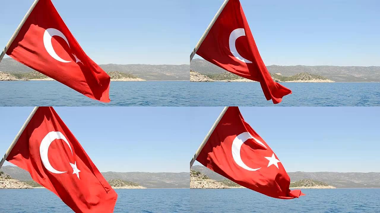 在阳光明媚的蓝天下挥舞着土耳其国旗
