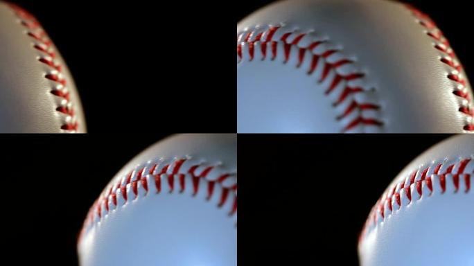 黑色背景上孤立的棒球球/白色球上的红色接缝