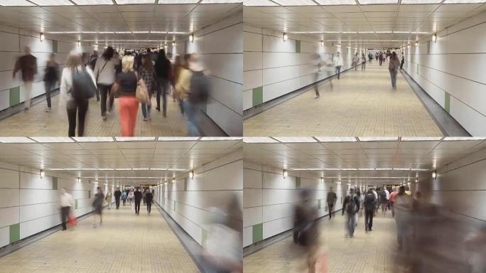 繁忙的地铁站中的人们登上火车和乘坐自动扶梯的时间流逝