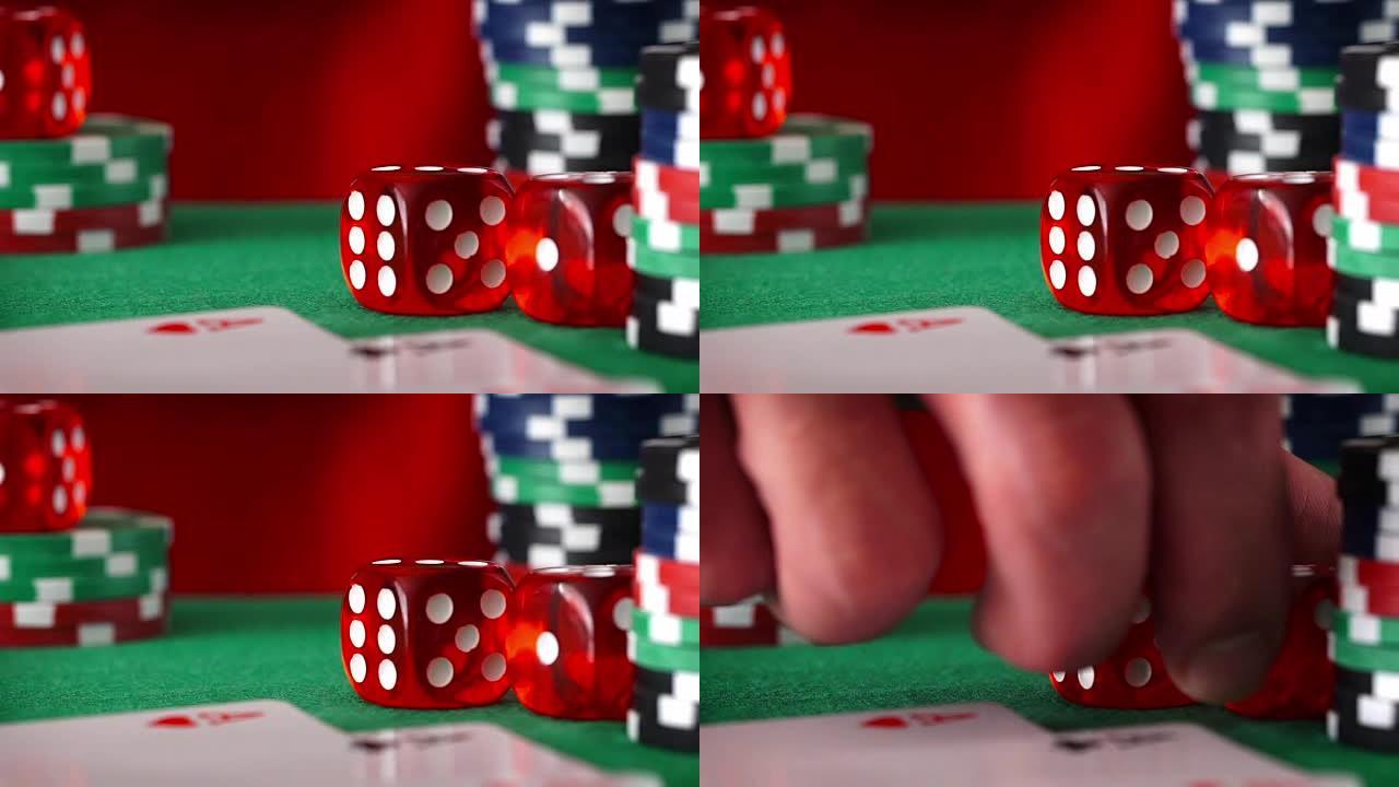 红色骰子按顺序滚动，赌场筹码，绿色毛毡上的卡