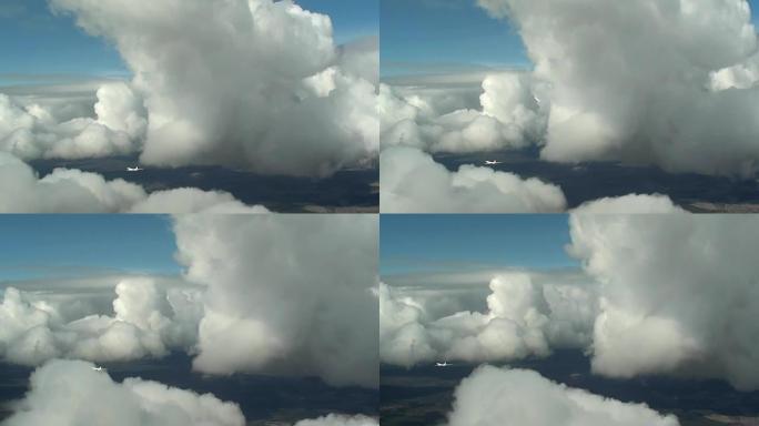 飞机在云层之间飞行