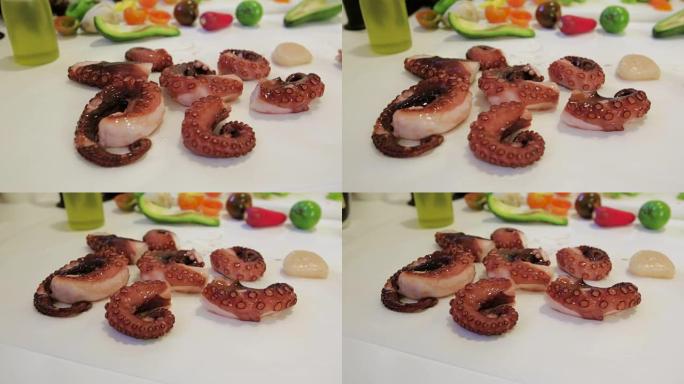 切菜板上的新鲜生章鱼，卧式平底锅，特写