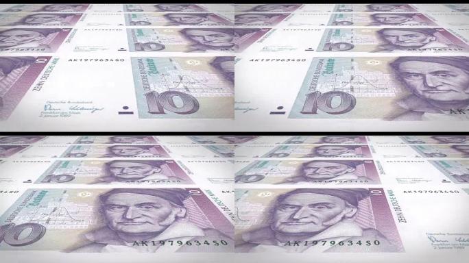 西德滚动的十个德国马克的钞票，现金