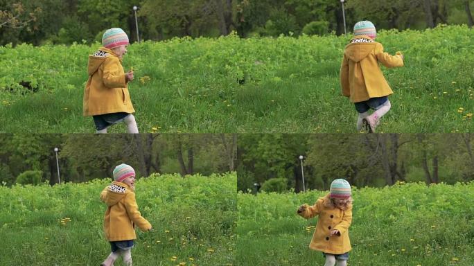 一个三岁的女孩在公园里玩耍和捧花。慢慢地