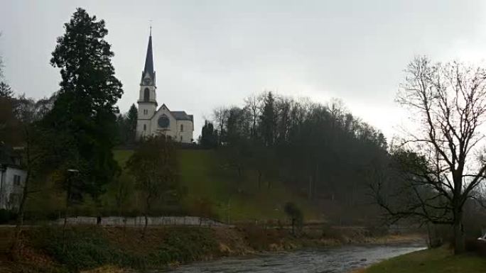 瑞士日时间adliswil pfarramt dreifaltigkeit教堂步行河边全景4k