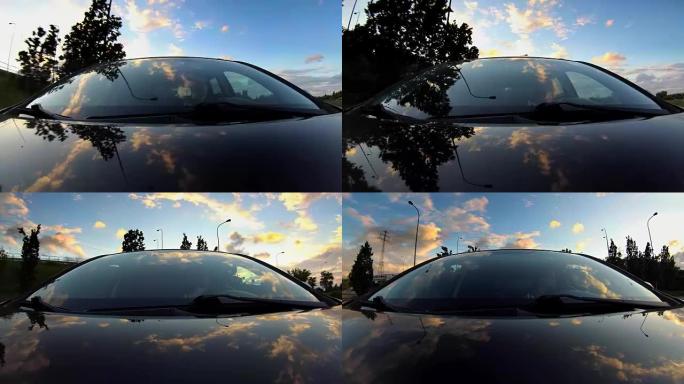 驾驶汽车前视挡风玻璃天空反射