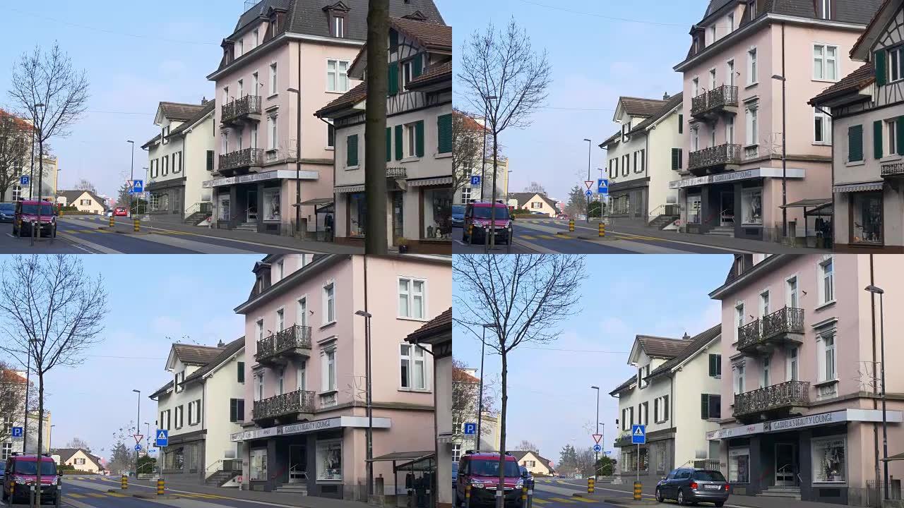 瑞士晴天时间adliswil城市交通街全景4k