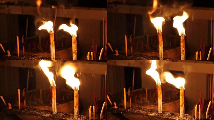 寺庙里的蜡烛和火
