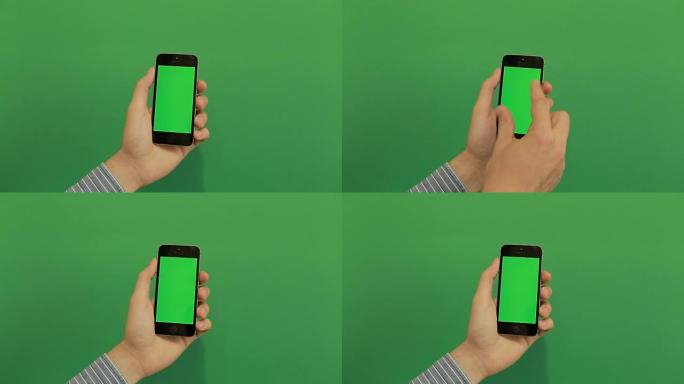 智能手机在绿色屏幕上放大手势