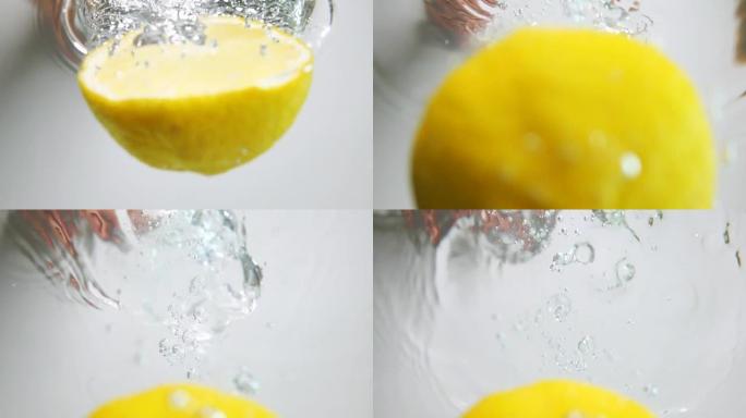 半柠檬倒入水中