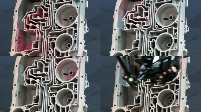 自动机械臂对复杂的内部铸造汽车发动机缸体进行3D激光扫描，以产生零件的计算机模型。