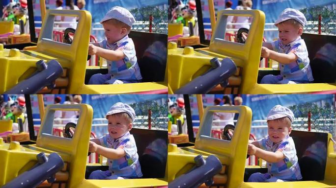 孩子在游乐园玩得开心。坐汽车