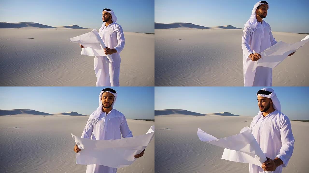 在炎热的一天，聪明的阿拉伯阿拉伯阿拉伯酋长建筑工人站在沙漠中间，检查区域和阅读施工蓝图