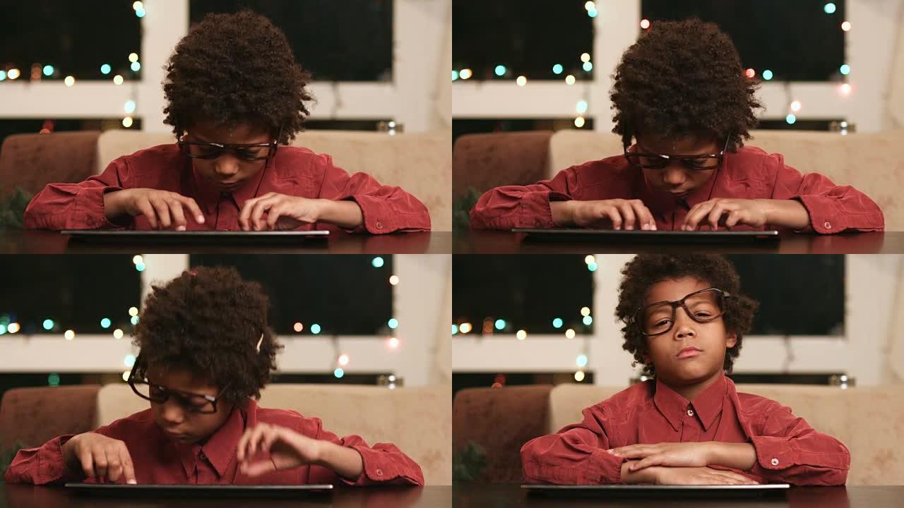 键盘上的黑人男孩不高兴。
