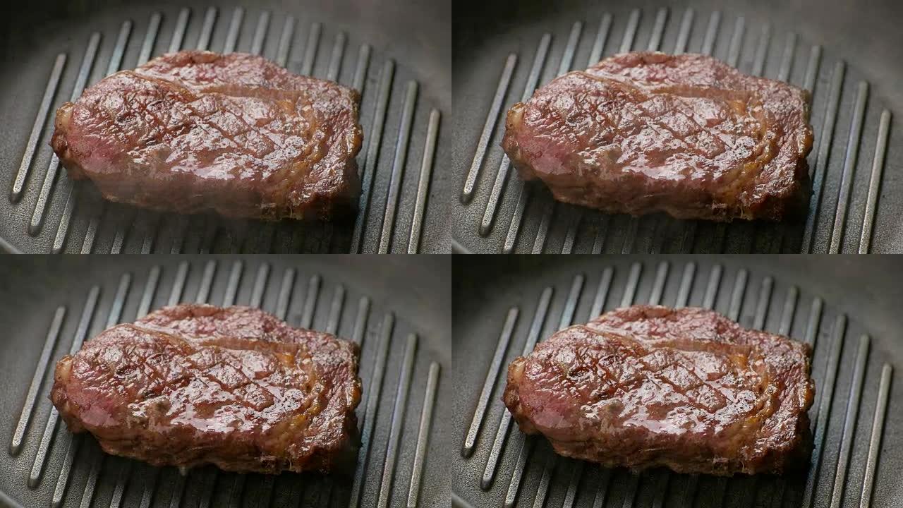 肉在平底锅上煎炸。