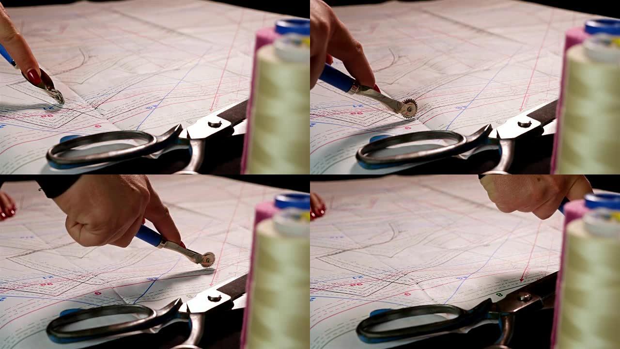 设计师测量带缝纫切割器的布