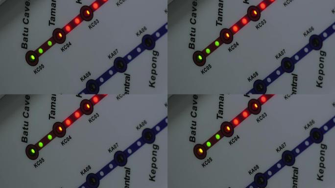 火车地图上绿色和红色灯泡照明的特写视图。马来西亚吉隆坡