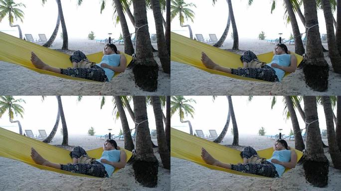 女人在热带海滩放松