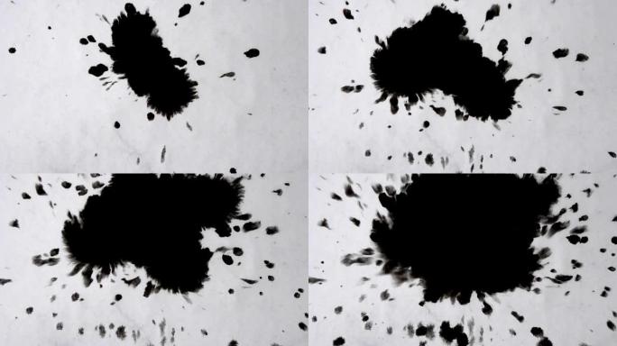白纸上滴的黑色墨水