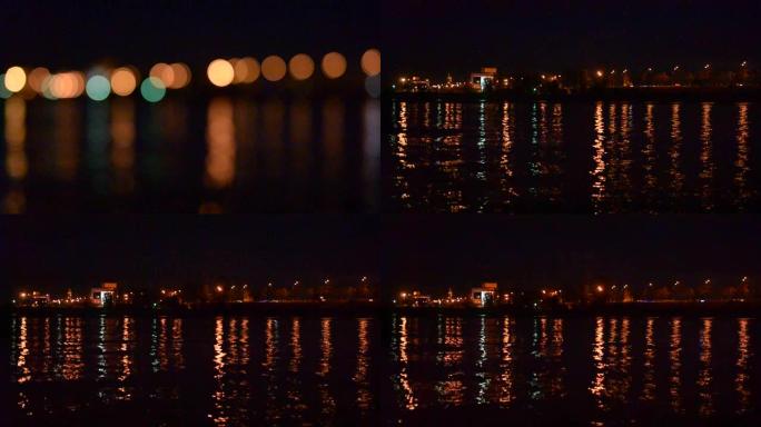 水上散焦的城市灯光成为焦点