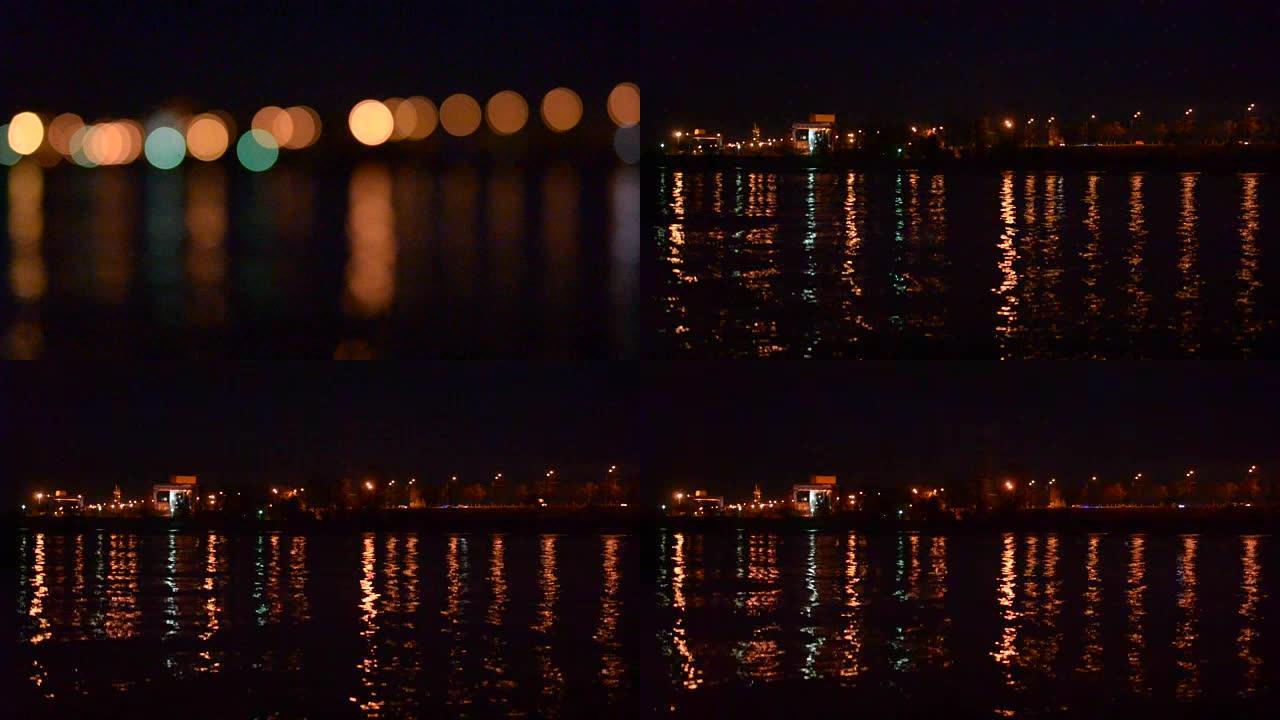 水上散焦的城市灯光成为焦点
