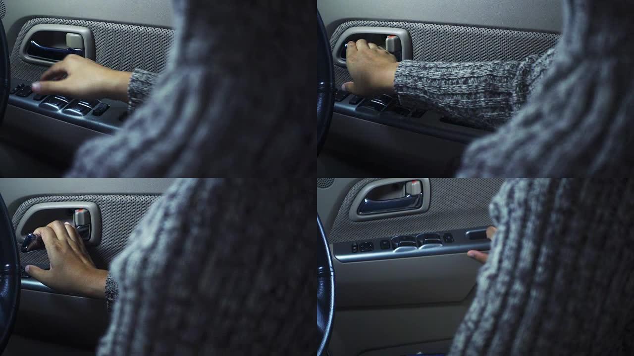 女孩的手使用中控锁手柄解锁汽车并打开车门。概念驾驶汽车。慢动作镜头