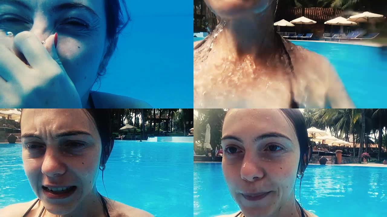 一名妇女潜水并屏住呼吸从游泳池中出来