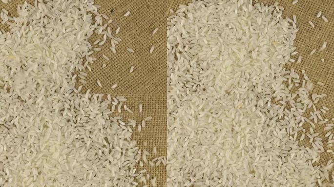 在旋转布粗麻布上掉落的米粒