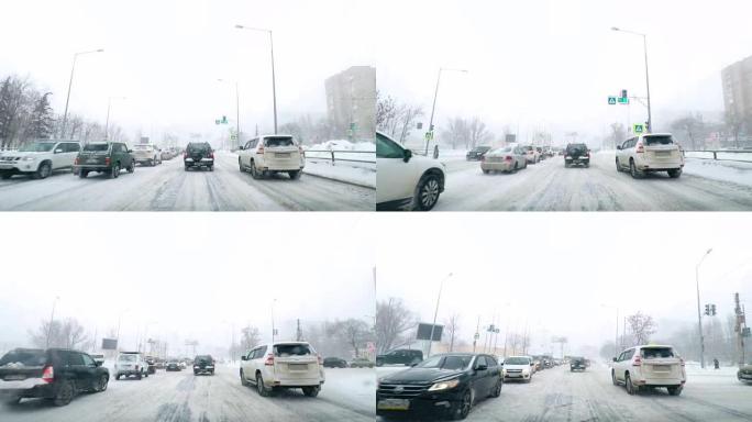 在雪道上驾驶POV。暴风雪驾驶城市街道快速延时。冬季暴风雪袭击。在积雪和结冰的道路上危险的驾驶条件。