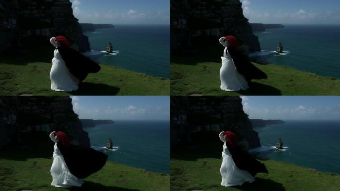 4k在爱尔兰Moher景观悬崖上拍摄的红发女王