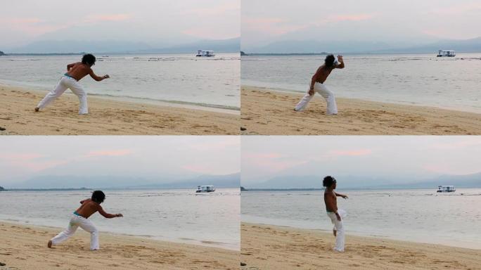 巴西卡波耶拉舞者在日出时在海滩上训练。
