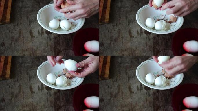 女人清洗煮鸡蛋的外壳