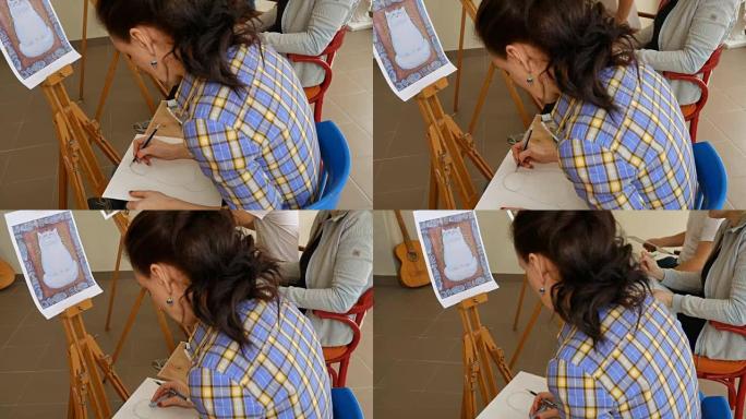 女艺术家在艺术工作室画铅笔素描
