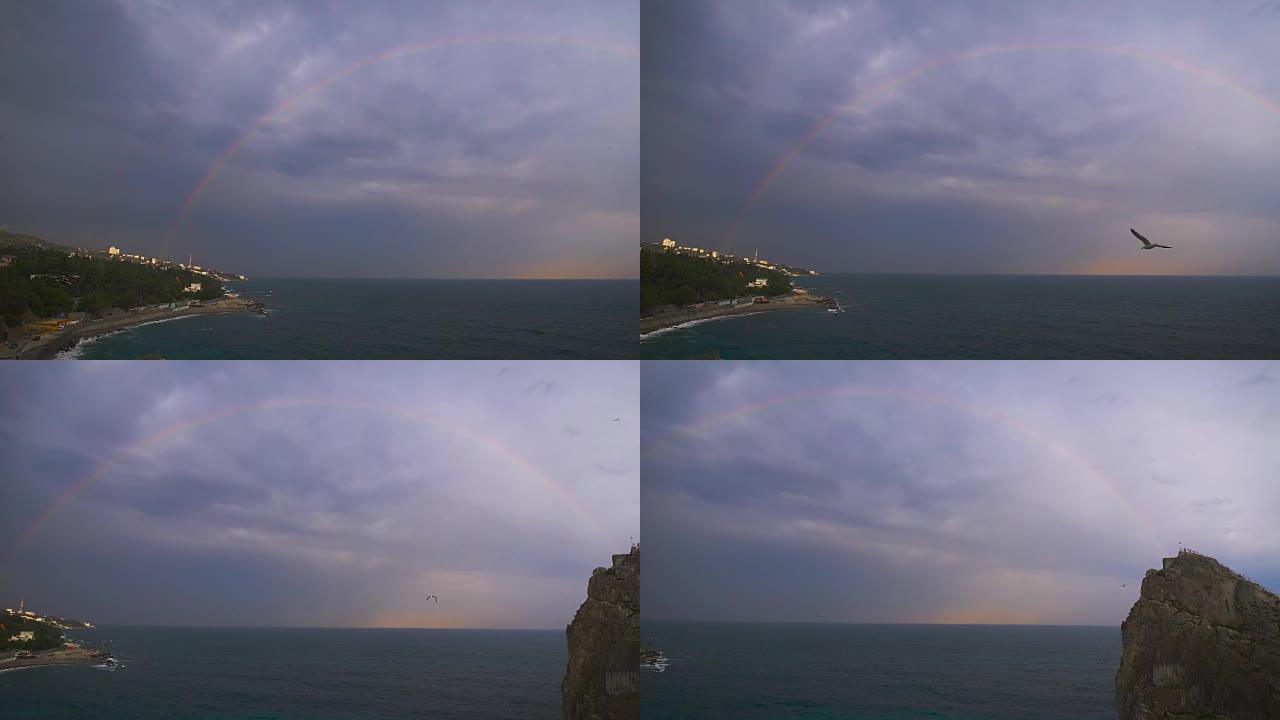 阴云密布的天空背景下，海上彩虹