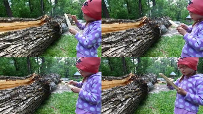 小女孩迅速打磨一块木头。