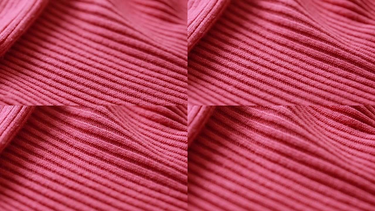 红色羊毛精纺毛衣图案。可以用作背景。