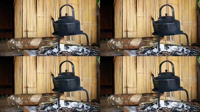 土著房屋窑炉上的复古水壶慢动作