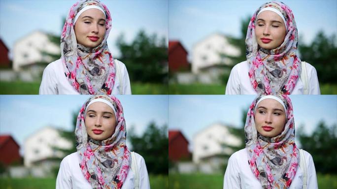 户外肖像中东妇女戴着头巾