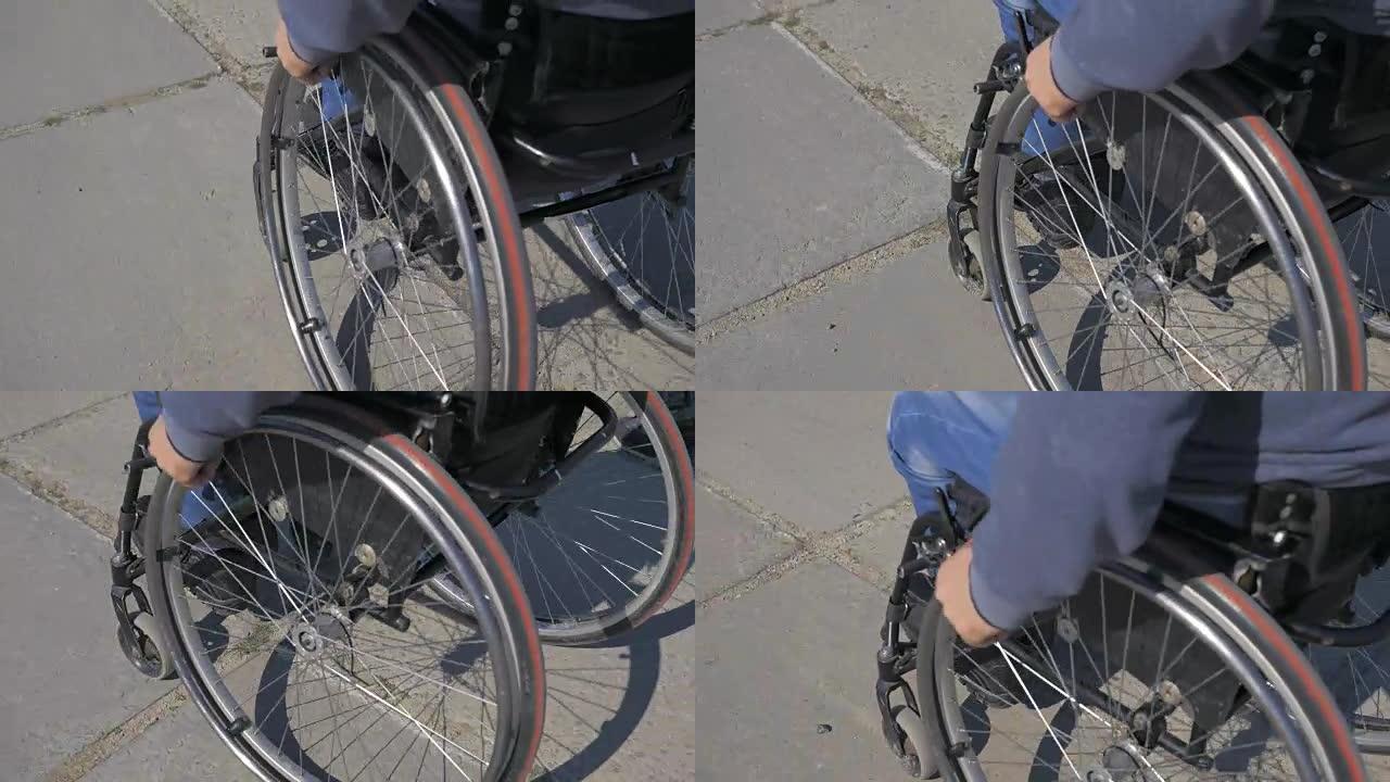 轮椅车轮，街道上的旅行轮椅困难，轮椅上的残疾人，残疾人运动