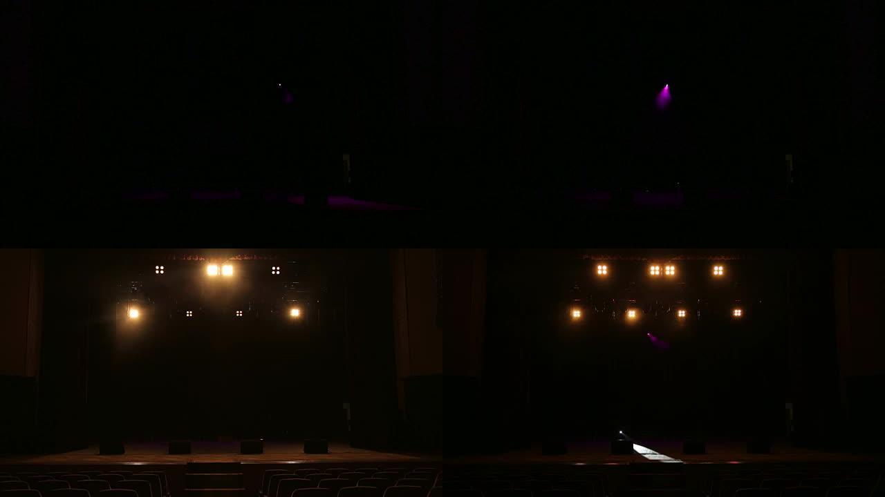 在空荡荡的剧院里闪烁着音乐会的灯光。