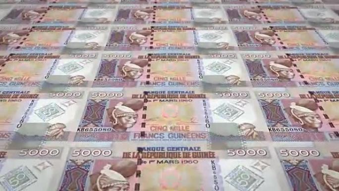 5,000几内亚法郎滚动的纸币，现金，循环