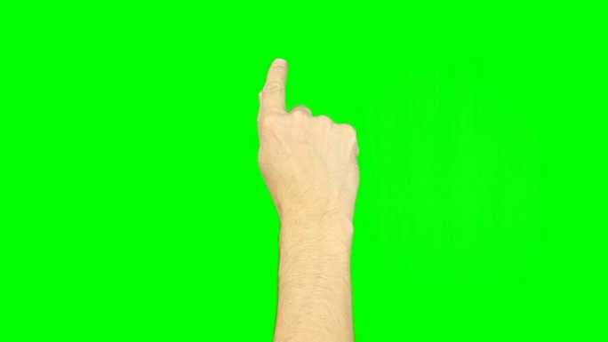 在绿色屏幕上用手指手势绘制心形。触摸板触摸屏平板电脑上的手势智能手机动力学小工具。镜头包含实心绿色而