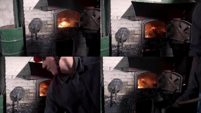 人在炉子里点燃火。
