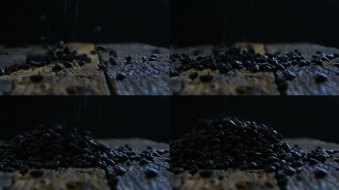 烤咖啡豆掉入木地板深色色调分级