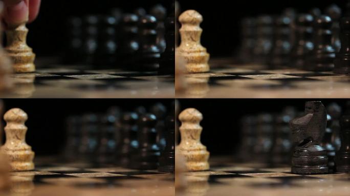 象棋游戏的镜头，用棋子的第一个动作，对手用骑士回答