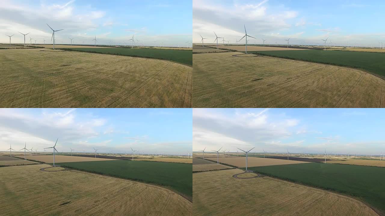 夏天麦田里的风力涡轮机。航空摄影测量