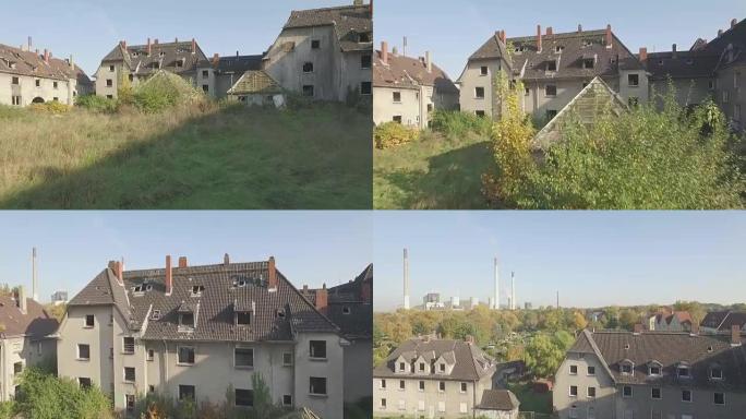 在德国煤矿小镇格拉德贝克 (Gladbeck) 的一个废弃地区的空中，低空，长时间的跟踪在草地上向前