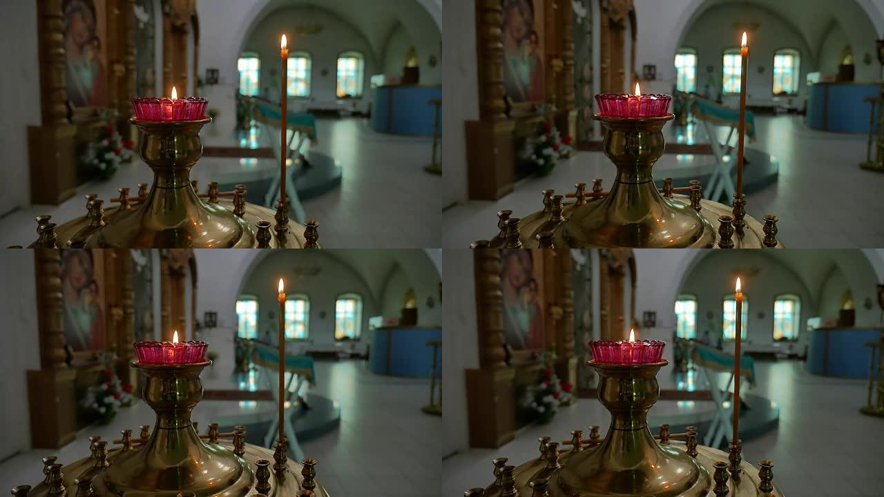 教堂中的深色蜡烛俄罗斯东正教圣礼慢动作视频